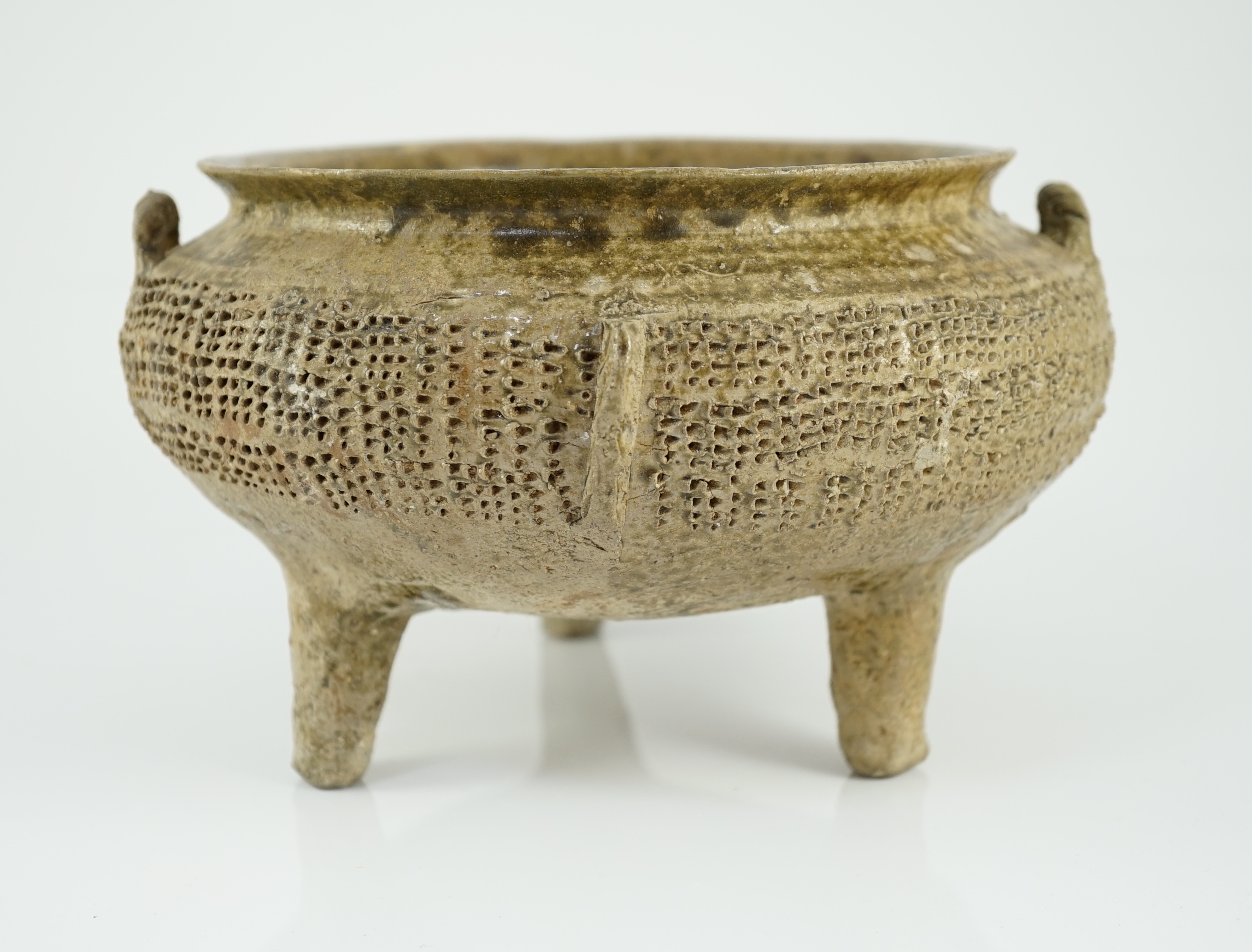 A Chinese proto-celadon tripod ritual vessel, ding, Western Zhou dynasty/Spring & Autumn period (1046 - 476 BC.)